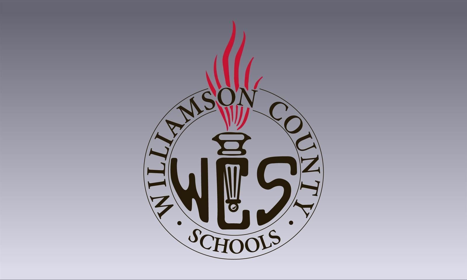WCS logo on gray background