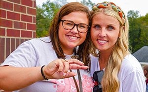 two teachers with a butterfly