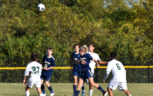 boys playing soccer
