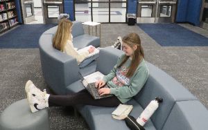 Students working in media center