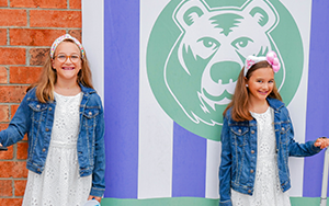  two girls in front of LES mural