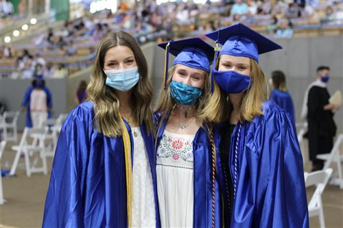 Three graduates 