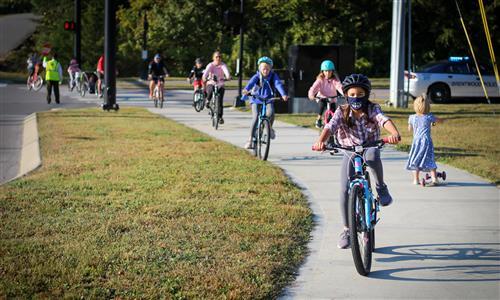 kids riding bikes to school 