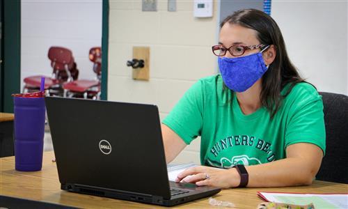Teacher at laptop 