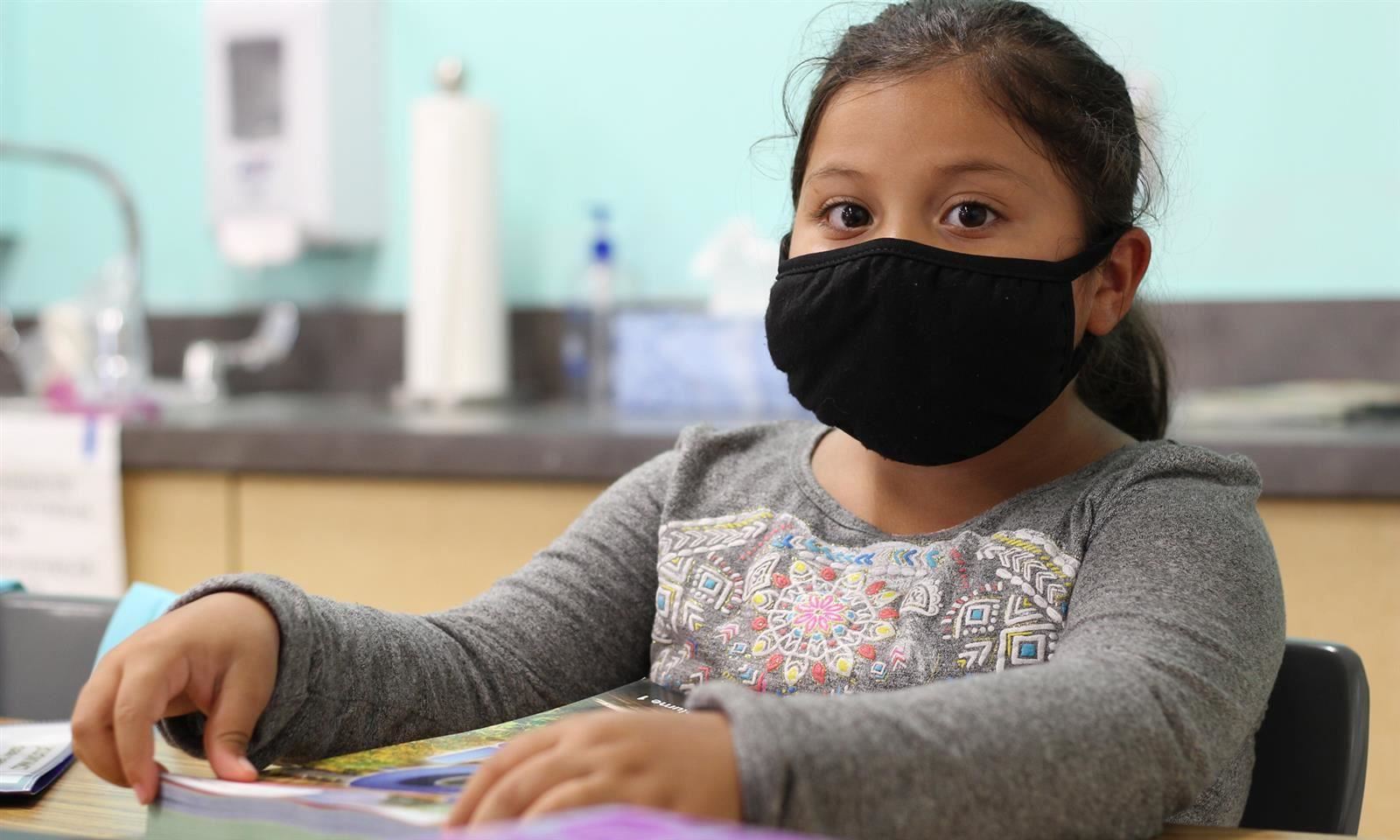 girl wearing mask 