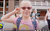  girl smiling with pink shirt