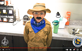 boy in safari outfit with mustache