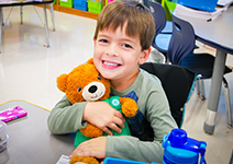  boy and a teddy bear
