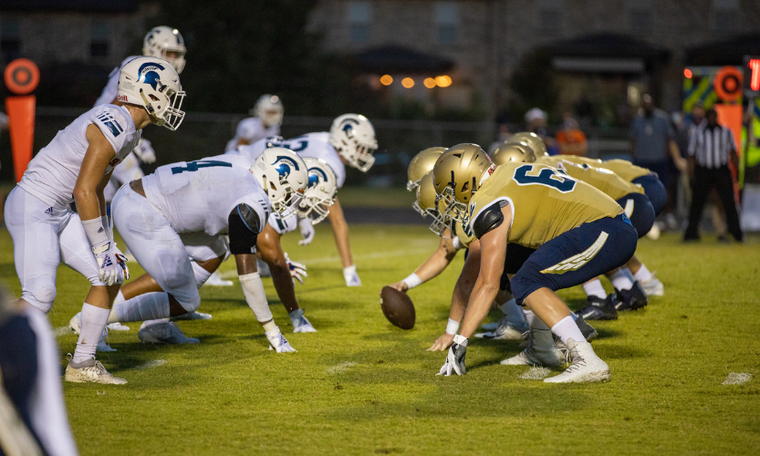 football players take the field 