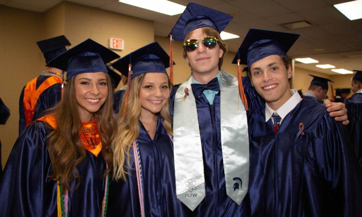 Summit High graduates smile 