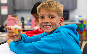  boy with a container
