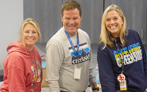  three teachers smiling