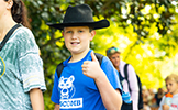  boy giving a thumbs up