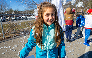  girl smiling outside