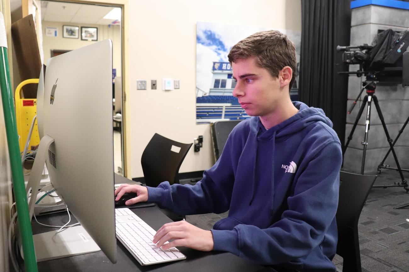 TV and media student working on a computer