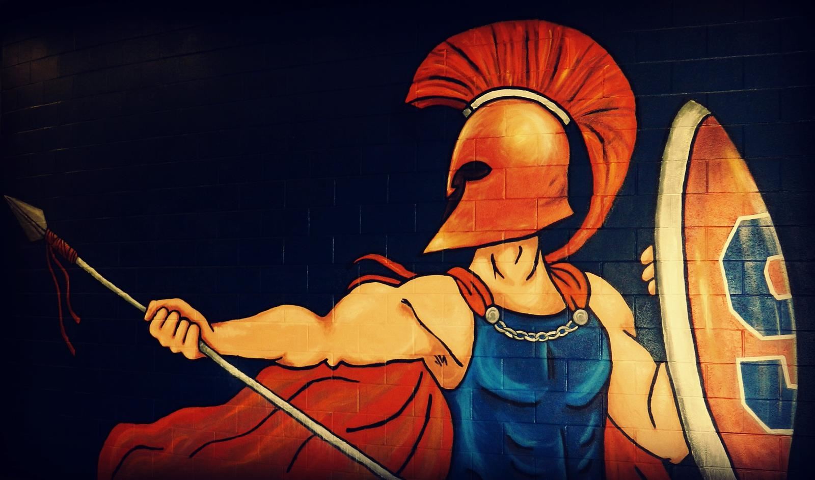 Summit High Spartan mural of warrior holding spear and shield.