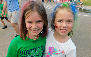  two girls with colorful hair