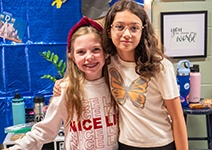  two girls smiling