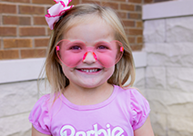  girl in pink glasses