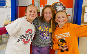  three girls in college gear