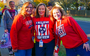  three teachers in red shirts