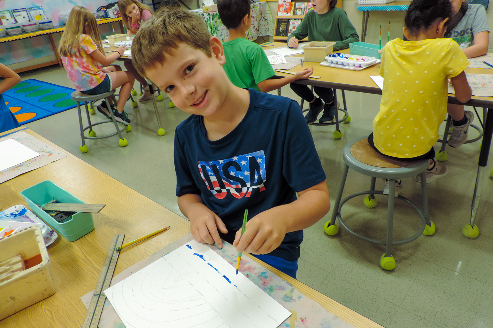 boy doing artwork