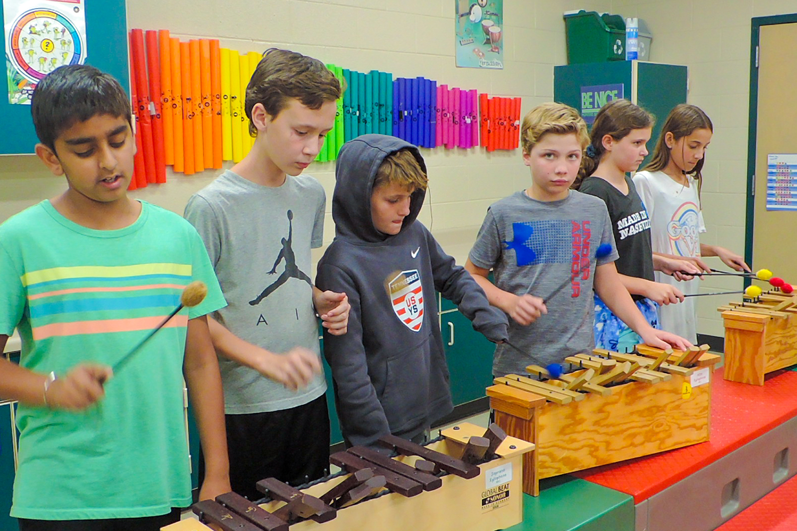 Students playing xylophone