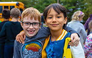  Male students at GES, one in glasses 