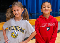  girl and boy in the gym