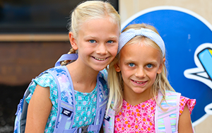  two girls smiling