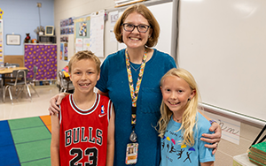  teacher with two students