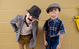  two boys dressed as 100 year olds