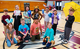  students in the costumes in the gym