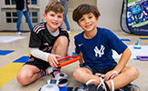 two boys with ipad