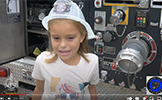  girl in a fireman hat