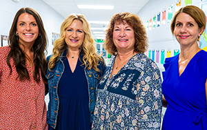  four ladies smiling