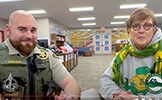  sheriff and teacher talking