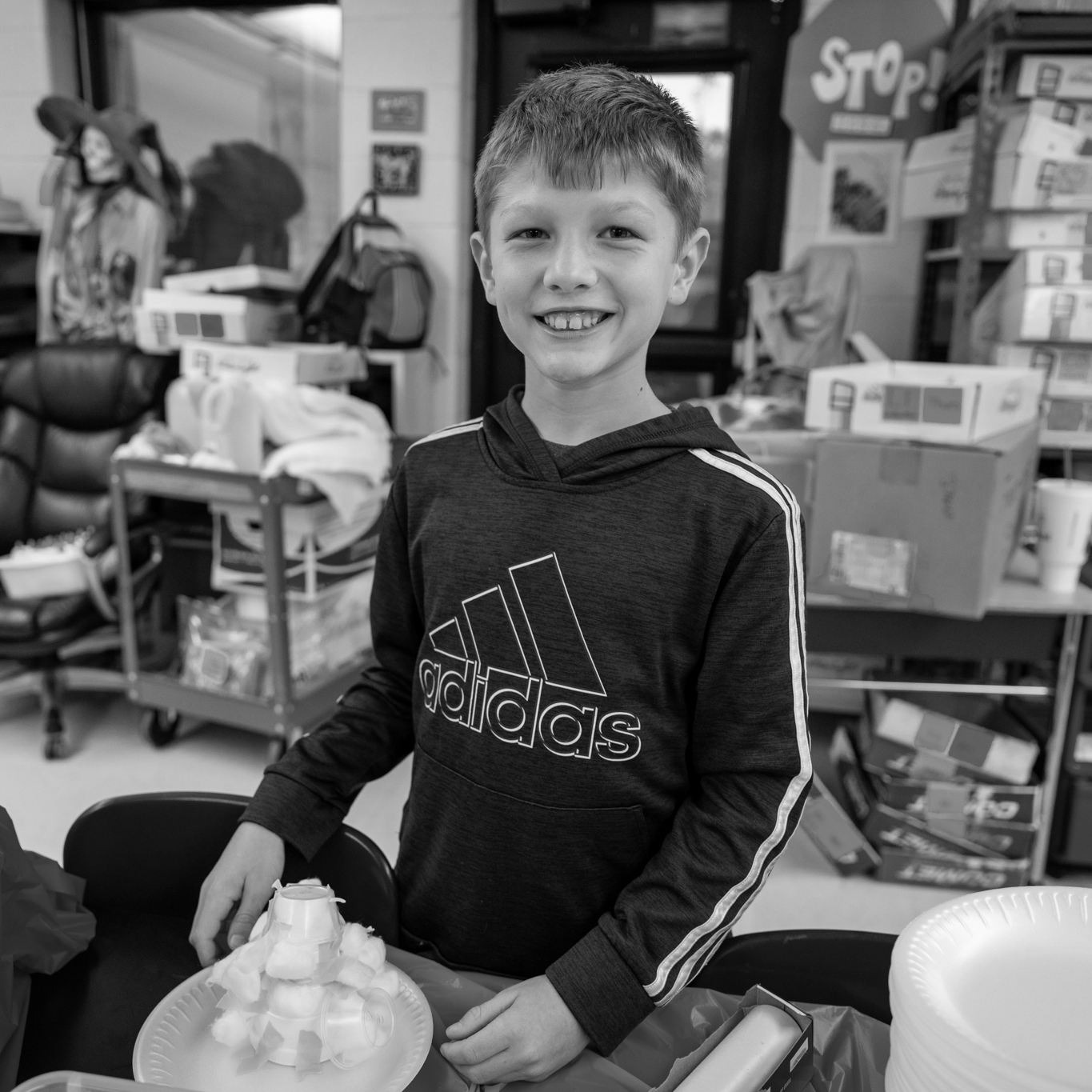 boy smiling in classroom