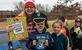  teacher dressed as waldo and boy student dressed as dog cop