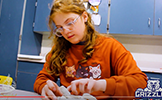  girl working with clay