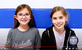  two girls smiling