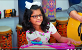 girl playing the ukulele