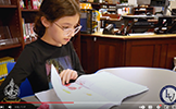  girl reading a book