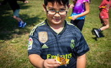  boy with a butterfly on an orange
