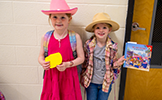 two girls with books 