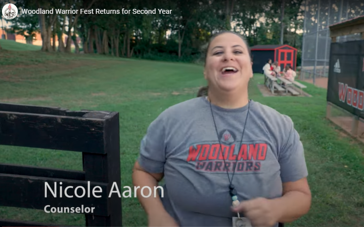  WMS counselor Ms. Aaron is shown promoting Warrior Fest