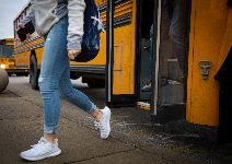  Student exiting a bus