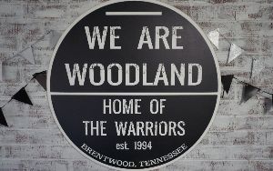  Woodland Home of the Warriors sign that appears in the sunroom