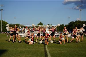 Warrior Dance Team performing during a football game