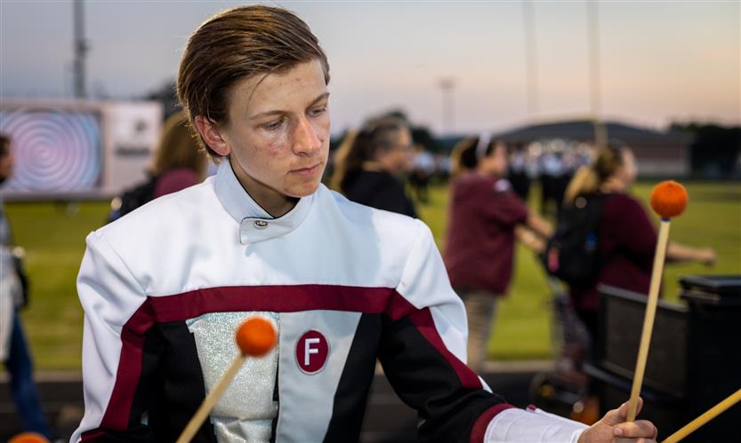 Bands perform on football field